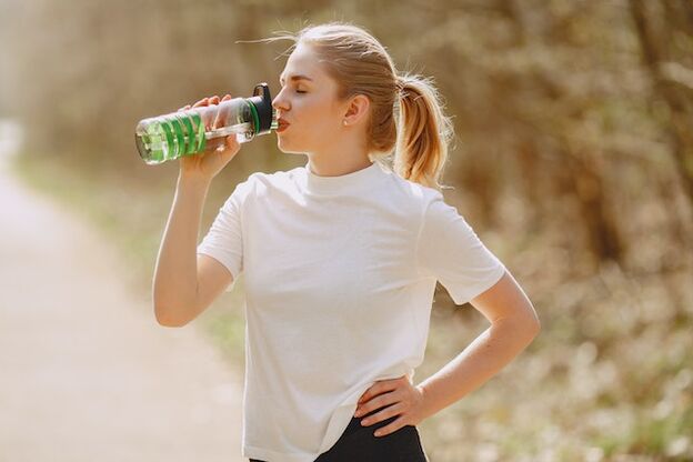 For a flat stomach, you should follow a drinking regime by consuming enough water